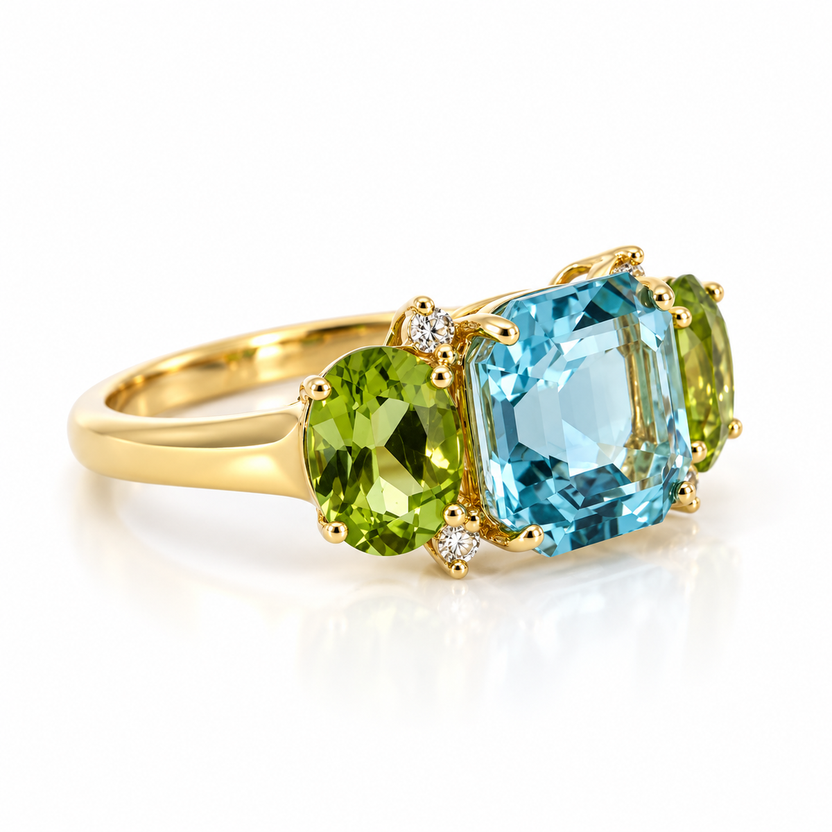 18kt Blue Topaz, Peridot and Diamond Three Stone Ring