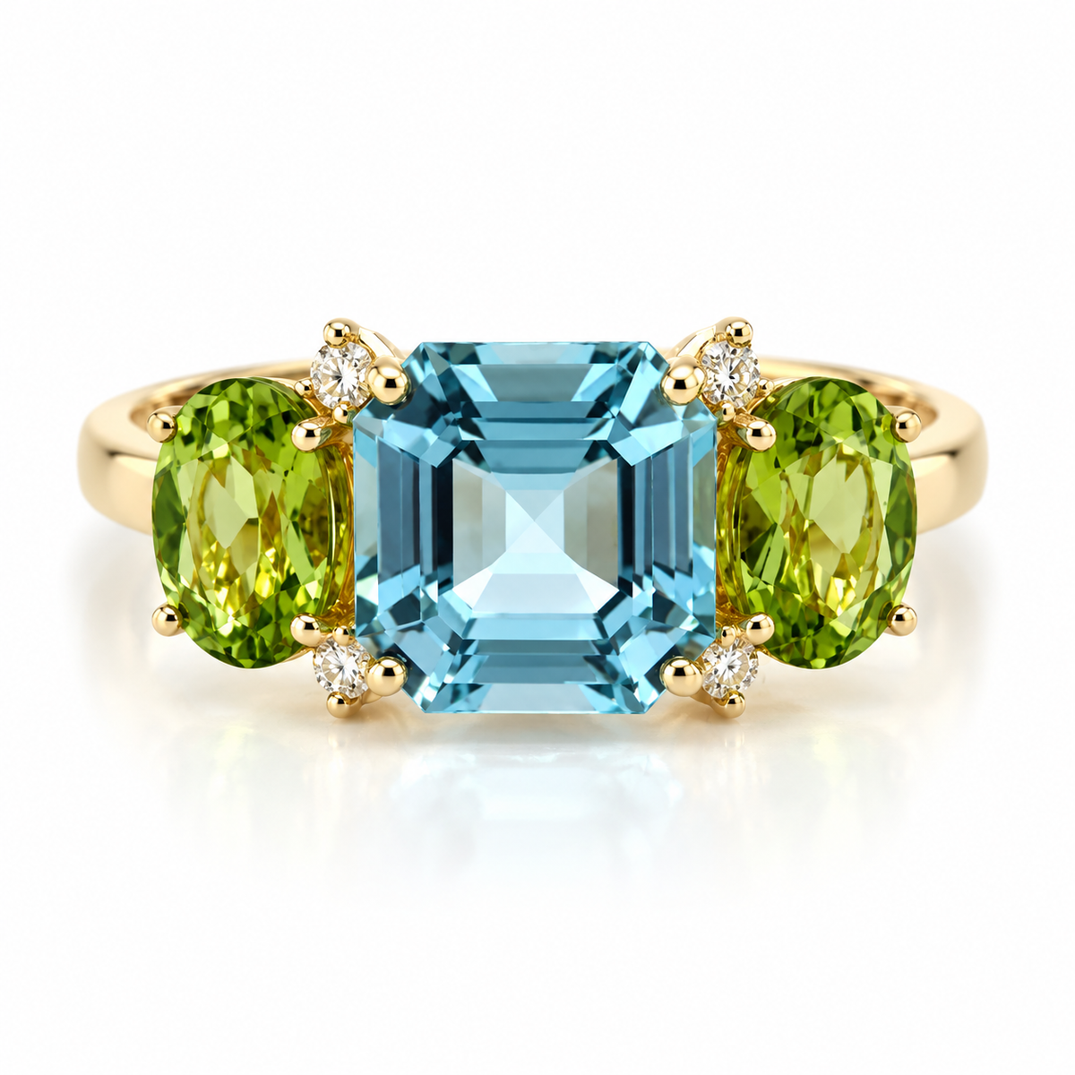 18kt Blue Topaz, Peridot and Diamond Three Stone Ring