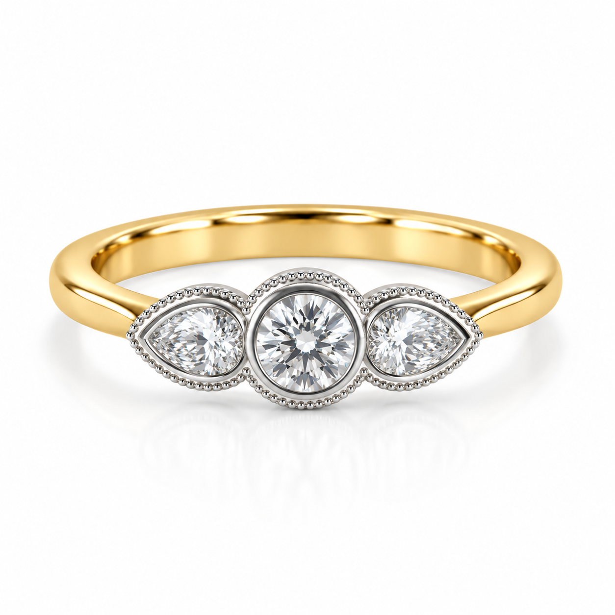 18kt Brilliant and Pear Cut Diamond Three Stone Engagement Ring