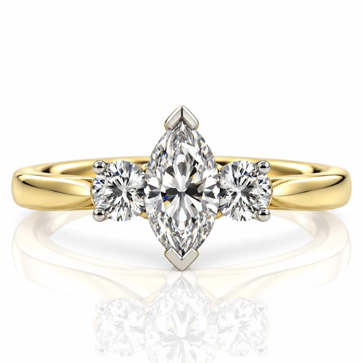 18kt Marquise/brilliant cut 3 stone Engagement Ring